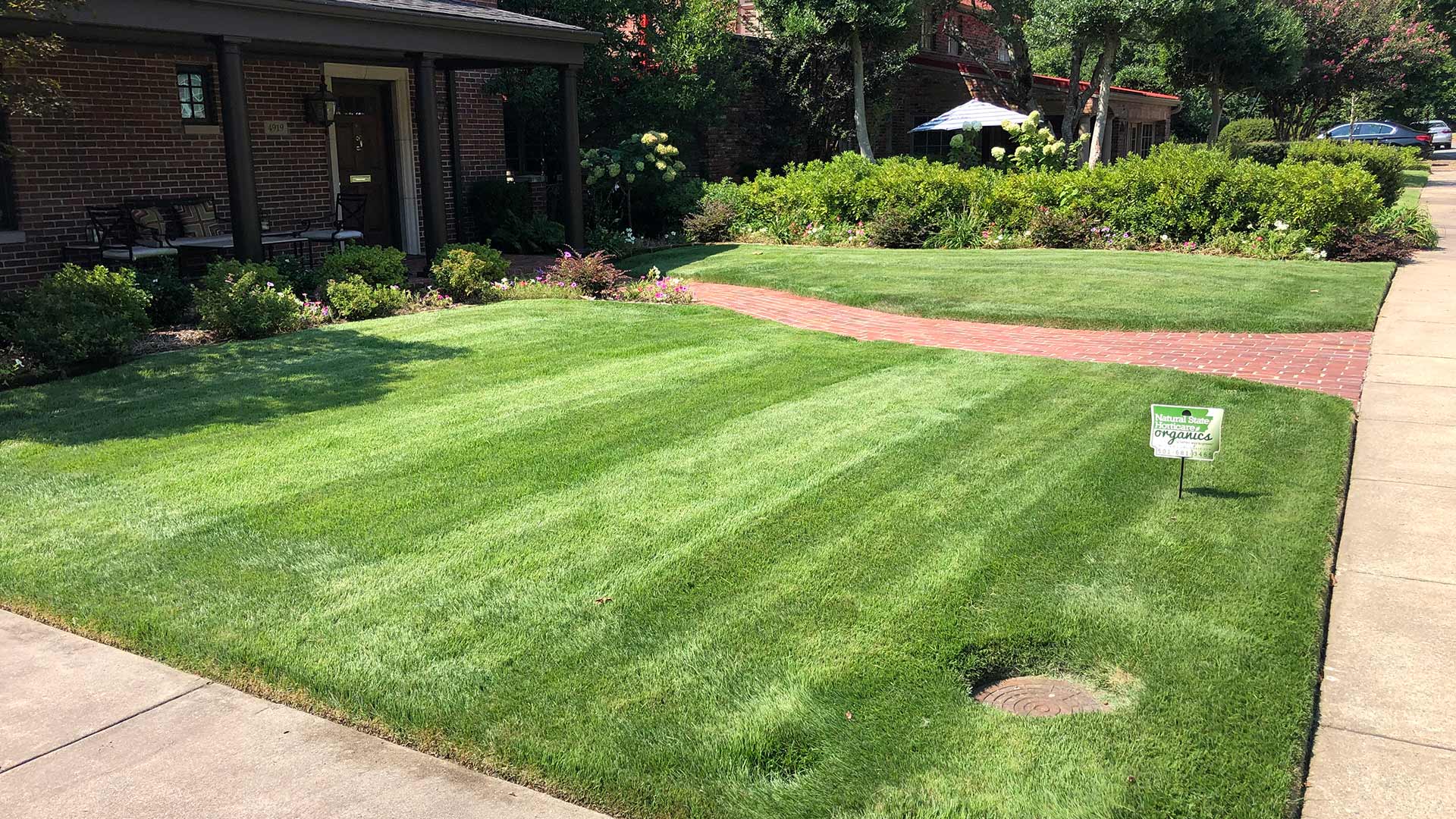 Beautiful home lawn at a property in North Little Rock, AR.