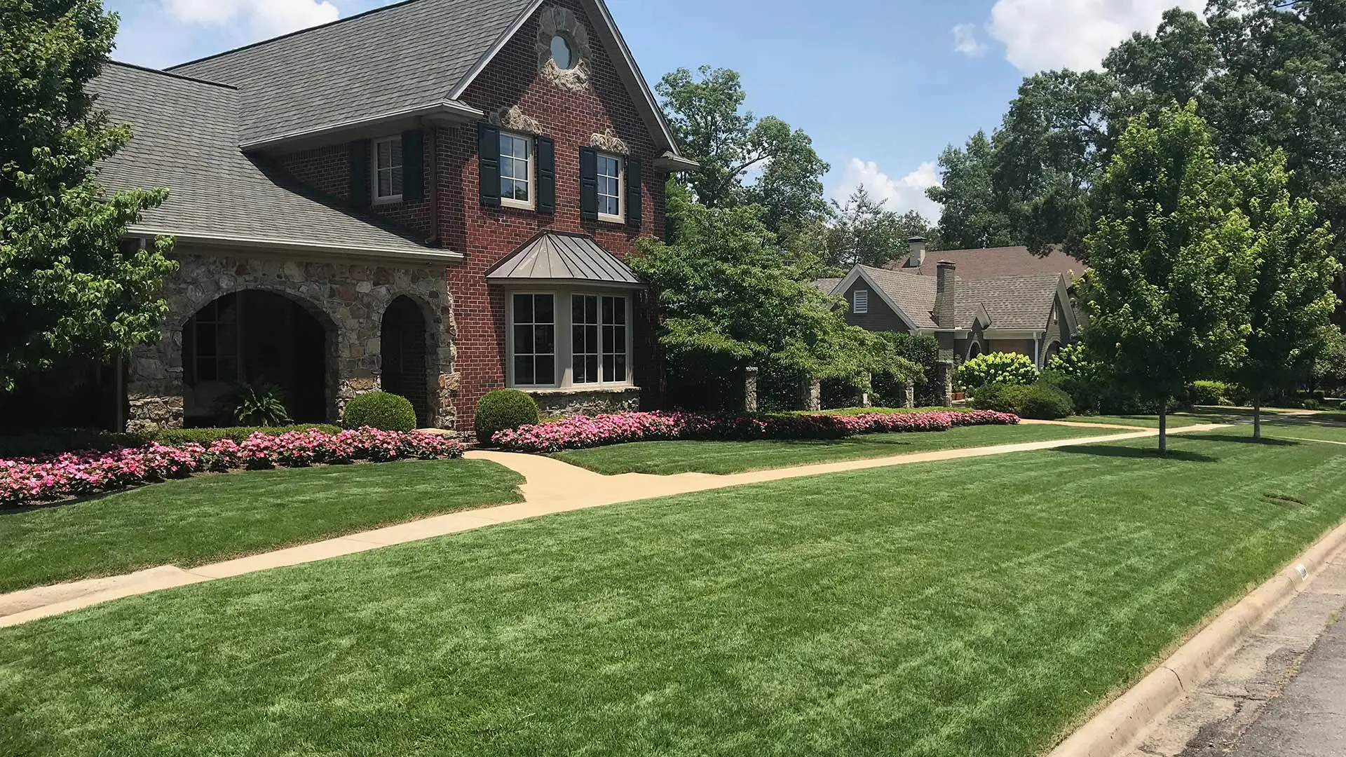 Beautiful yard with landscaping shrubs and bushes in Little Rock, AR.